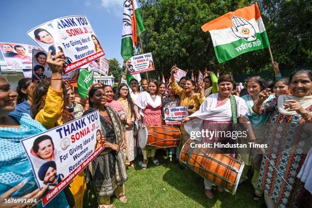 Congress leaders along with supporters celebrates to thank Congress leader Sonia Gandhi for her constant pursual on Women Reservation Bill at AICC on...