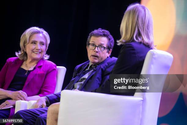 Hillary Clinton, former US secretary of state, from left, Michael J. Fox, founder of The Michael J. Fox Foundation for Parkinson's Research, and Debi...