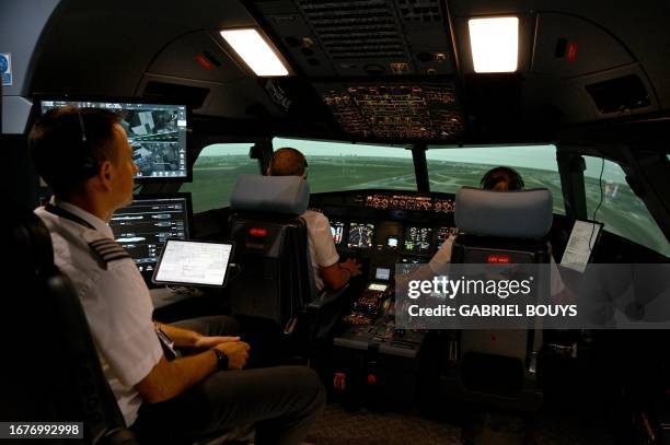 EasyJet's instructor and airline pilots train in a flight simulator at the EasyJet's CAE center near the Milan Malpensa airport on September 18, 2023...