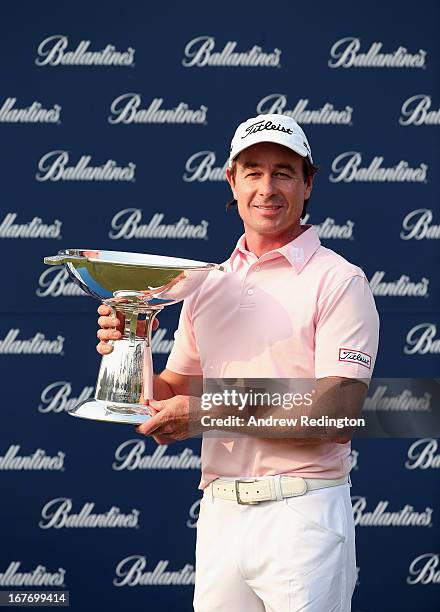 Brett Rumford of Australia poses with the trophy after winning the Ballantine's Championship at Blackstone Golf Club on April 28, 2013 in Icheon,...