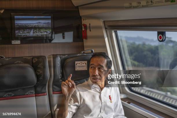 Joko Widodo, Indonesia's president, onboard a Jakarta-Bandung High-Speed Railway train near Padalarang Station, Bandung, Indonesia, on Tuesday, Sept....