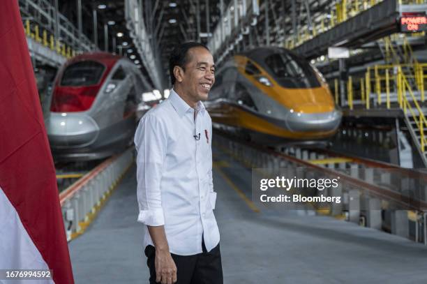 Joko Widodo, Indonesia's president, at Tegalluar station in front of Jakarta-Bandung High-Speed Railway trains in West Java, Indonesia, on Tuesday,...