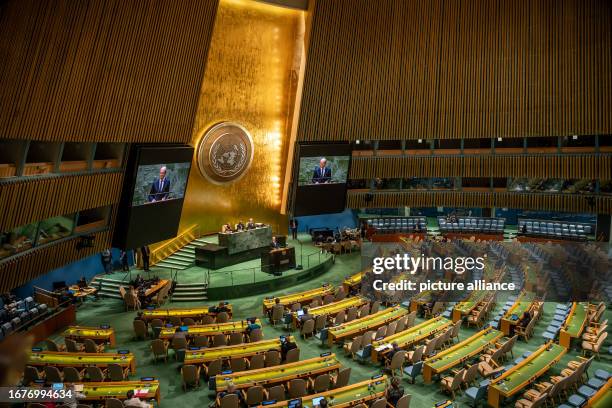 September 2023, USA, New York: German Chancellor Olaf Scholz speaks to empty rows of seats at the general debate of the UN General Assembly. More...