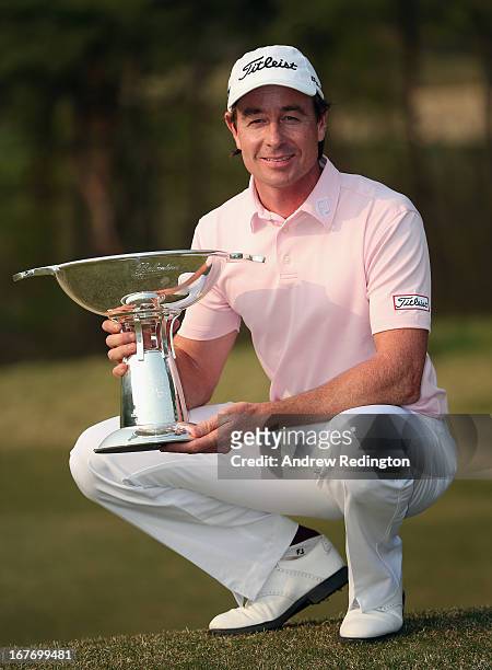 Brett Rumford of Australia poses with the trophy after winning the Ballantine's Championship at Blackstone Golf Club on April 28, 2013 in Icheon,...