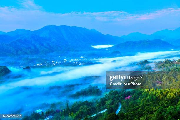 Morning fog shrouding the Kongshan National Forest Park in Tongjiang County, Bazhong City, Sichuan Province, China, September 16, 2023.