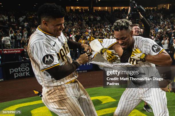 Juan Soto rips the jersey off Xander Bogaerts of the San Diego Padres after Bogaerts' walk-off home run against the Colorado Rockies on September 19,...