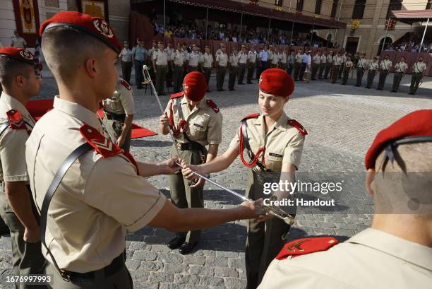 In this handout image provided by the Royal Household, Princess Leonor of Spain attends the 'Act of delivery of Sabers' at The General Military...