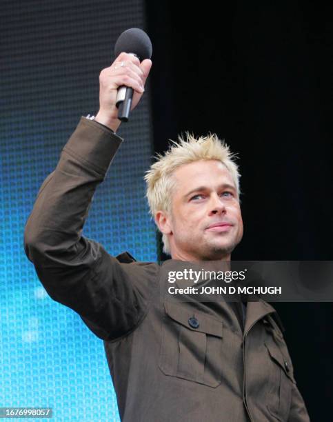 Actor Brad Pitt addresses the crowd during the Live8 concert in Hyde Park, London, 02 July 2005. The main concert in the Live 8 series of global...