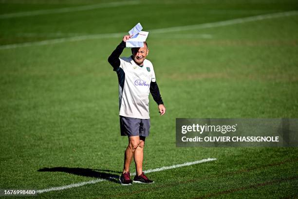 Australia's head coach Eddie Jones gestures as he watches his players taking part in a Rugby World Cup 2023 training session at Stade Roger Baudras...