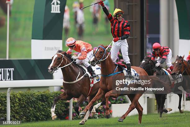 Brett Prebble rides Rainbow Chic to win the Audemars Piguet Royal Oak Handicap during the Audemars Piguet Queen Elizabeth II race meeting at Sha Tin...