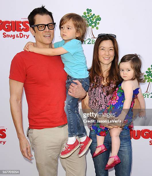 Johnny Knoxville, wife Naomi Nelson and children Rocko Akira Clapp and Arlo Lemoyne Yoko Clapp attend the Baby2Baby Mother's Day garden party on...