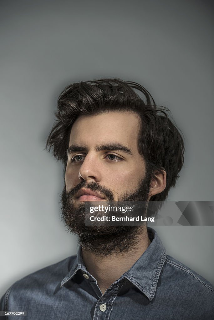 Portrait of  young bearded man