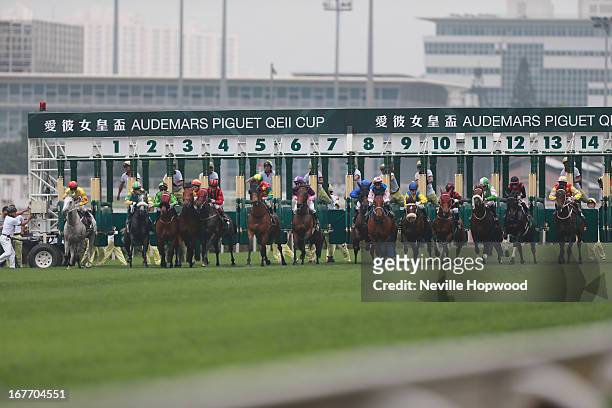 The horses break from the gate during the Audemars Piguet Queen Elizabeth II Cup at Sha Tin racecourse on April 28, 2013 in Hong Kong, Hong Kong.