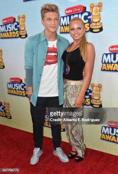 Singer Cody Simpson and actress Alli Simpson arrive to the 2013 Radio Disney Music Awards at Nokia Theatre L.A. Live on April 27, 2013 in Los...