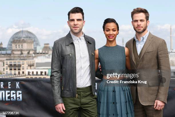Zachary Quinto, Zoe Saldana and Chris Pine attend the 'Star Trek Into Darkness' Photocall at China Club on April 28, 2013 in Berlin, Germany.