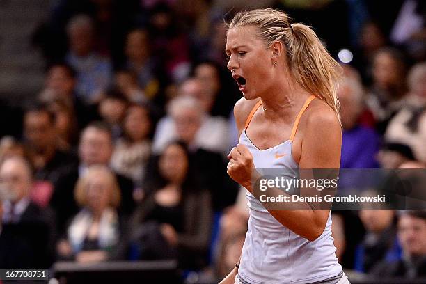 Maria Sharapova of Russia reacts during her final match against Na Li of China during Day 7 of the Porsche Tennis Grand Prix at Porsche-Arena on...