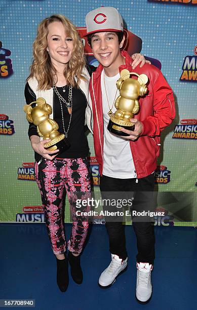 Actress/singer Bridgit Mendler and singer Austin Mahone pose backstage at the 2013 Radio Disney Music Awards at Nokia Theatre L.A. Live on April 27,...