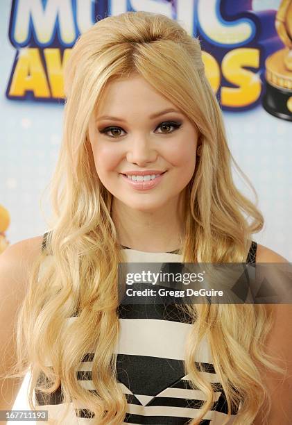 Actress Olivia Holt arrives at the 2013 Radio Disney Music Awards at Nokia Theatre L.A. Live on April 27, 2013 in Los Angeles, California.