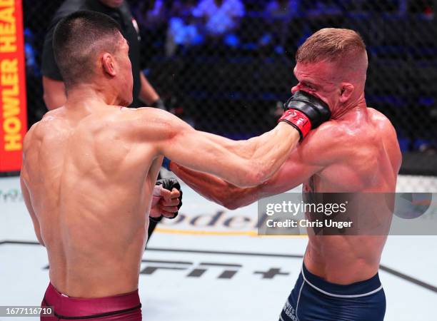 Steven Nguyen punches AJ Cunningham in a featherweight fight during Dana White's Contender Series season seven, week six at UFC APEX on September 12,...