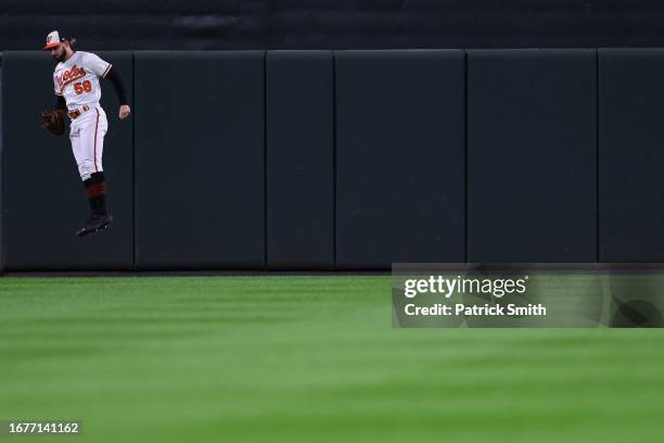 Pitcher Cionel Perez of the Baltimore Orioles leaves the bullpen before pitching against the St. Louis Cardinals at Oriole Park at Camden Yards on...