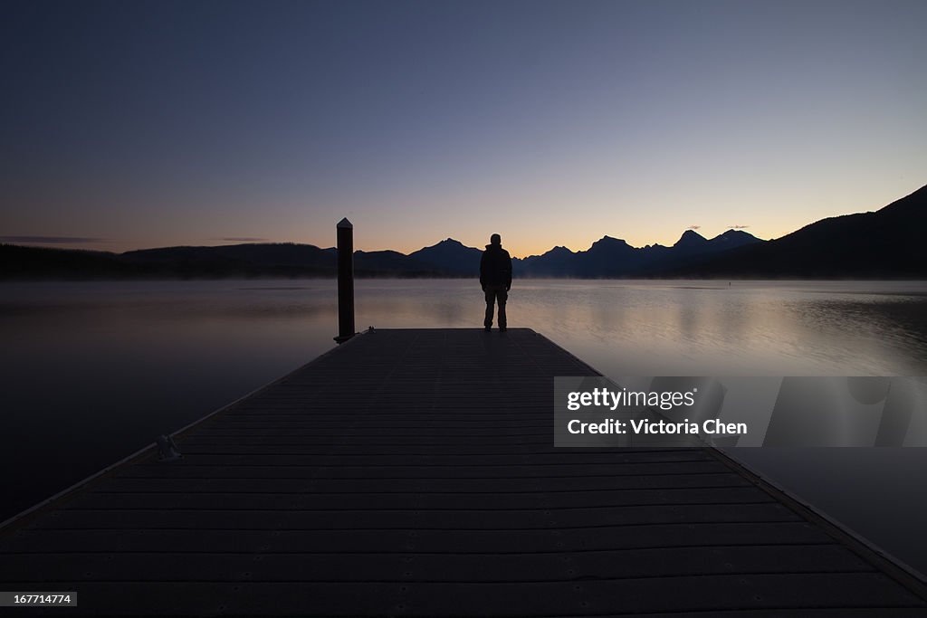 Man at Pier in Glacier National Park Montana