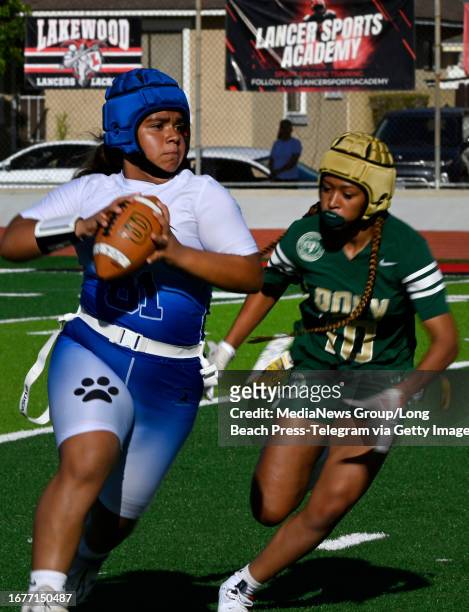 Lakewood, CA Lilianna Sarmiento running the ball for Jordan High School during the flag football game against Poly High School in Lakewood on...