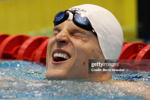 Steffen Deibler of Hamburger SC reacts after winning the men's 50 m freestyle A final and the German Championship 2013 during day three of the German...