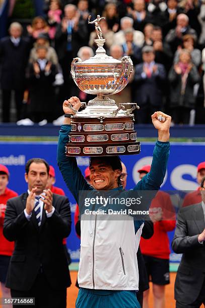 Rafael Nadal of Spain celebrates holds the trophy after winning his final match againts Nicolas Almagro of Spain, during day seven of the 2013...