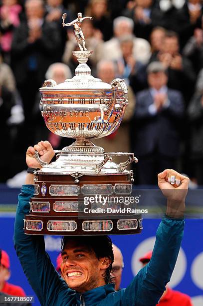 Rafael Nadal of Spain holds the trophy after winning his final match againts Nicolas Almagro of Spain during day seven of the 2013 Barcelona Open...