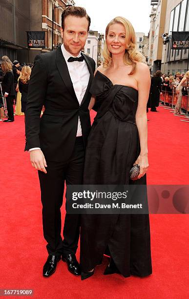 Rafe Spall and Elize du Toit arrive at The Laurence Olivier Awards 2013 at The Royal Opera House on April 28, 2013 in London, England.
