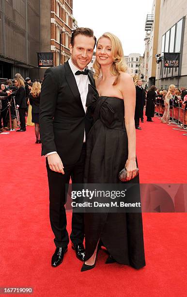 Rafe Spall and Elize du Toit arrive at The Laurence Olivier Awards 2013 at The Royal Opera House on April 28, 2013 in London, England.