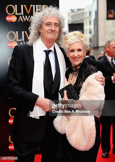 Brian May and Anita Dobson attends The Laurence Olivier Awards at the Royal Opera House on April 28, 2013 in London, England.