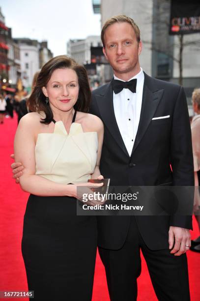 Dervla Kirwan and Rupert Penry-Jones attends The Laurence Olivier Awards at The Royal Opera House on April 28, 2013 in London, England.