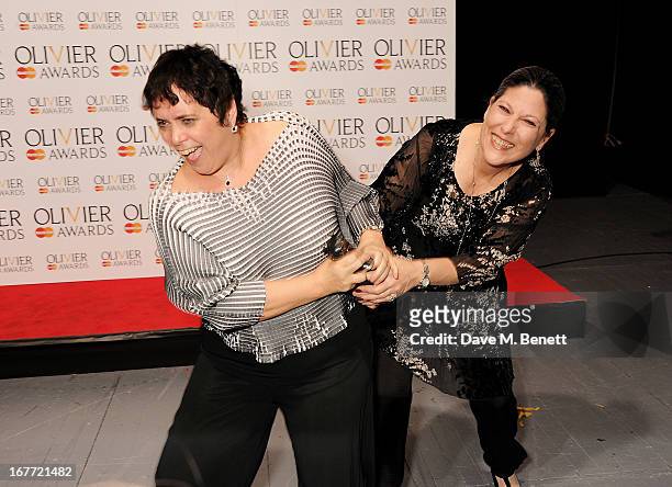 Nica Burns and Kim Poster, winners of Best Revival for 'Long Day's Journey Into Night', pose in the press room at The Laurence Olivier Awards 2013 at...