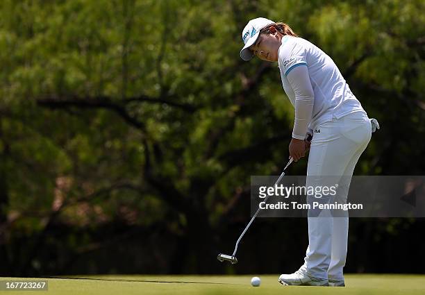 Inbee Park of South Korea putts the ball during the final round of the 2013 North Texas LPGA Shootout at the Las Colinas Counrty Club on April 28,...