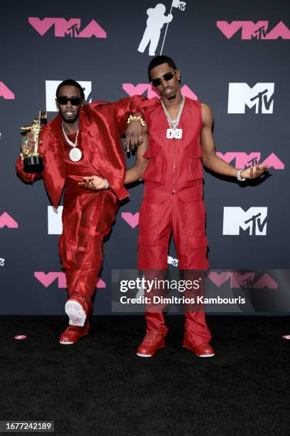 Diddy poses in the press room with his Global Icon Award and his son King Combs at the 2023 MTV Video Music Awards at Prudential Center on September...