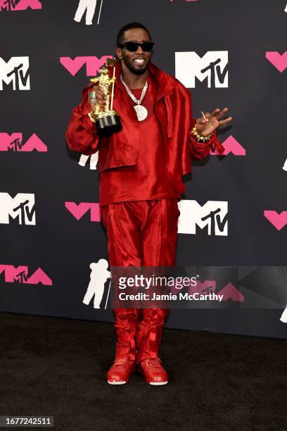 Diddy poses in the press room with his Global Icon Award at the 2023 MTV Video Music Awards at Prudential Center on September 12, 2023 in Newark, New...