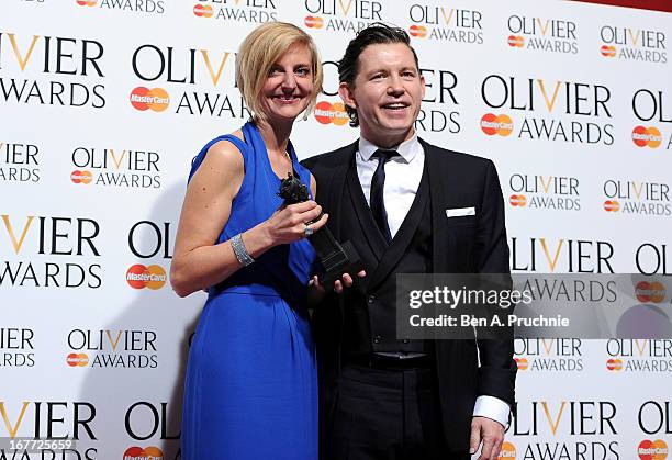 Marianne Elliott with her Best Director award with presenter Lee Evans during The Laurence Olivier Awards at the Royal Opera House on April 28, 2013...