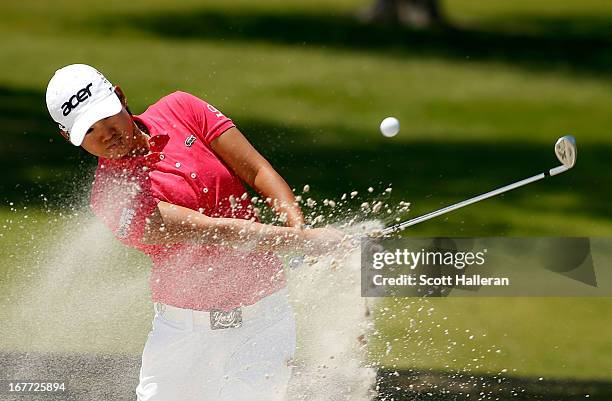 Yani Tseng of Taiwan hits a bunker shot during the final round of the 2013 North Texas LPGA Shootout at the Las Colinas Counrty Club on April 28,...