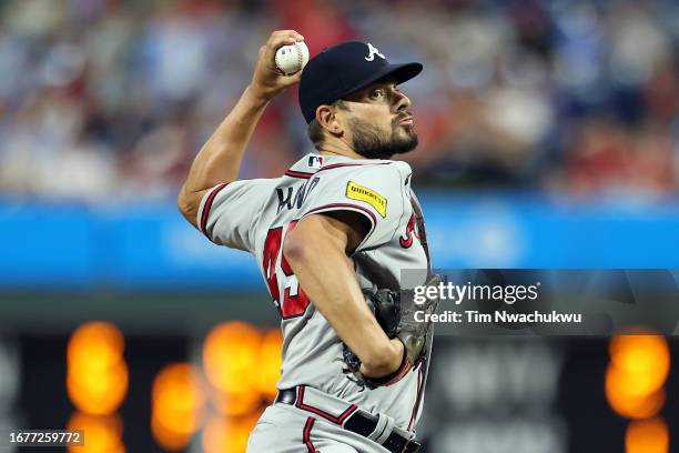 Brad Hand of the Atlanta Braves pitches during the tenth inning against the Philadelphia Phillies at Citizens Bank Park on September 12, 2023 in...