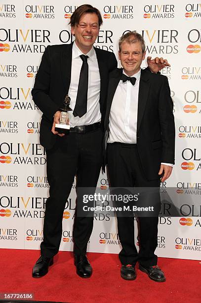 Simon Stephens and Mark Haddon, winners of the Mastercard Best New Play award for 'The Curious Incident Of The Dog In The Night-Time', pose in the...