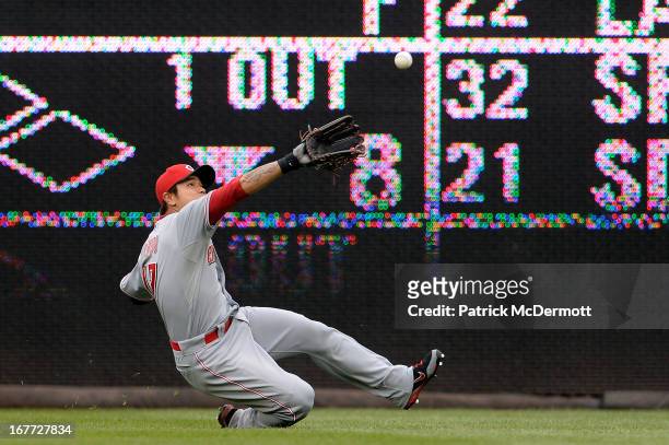 Shin-Soo Choo of the Cincinnati Reds fails to catch an Ian Desmond of the Washington Nationals RBI double in the eighth inning during a game at...