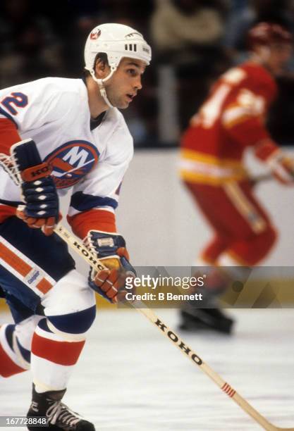 Mike McEwen of the New York Islanders skates on the ice during an NHL game against the Calgary Flames on November 3, 1981 at the Nassau Coliseum in...
