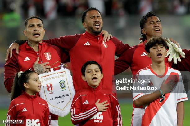 Paolo Guerrero of Peru sings the national anthem with teammates prior to a FIFA World Cup 2026 Qualifier match between Peru and Brazil at Estadio...