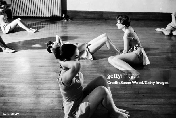 Group of female students at Barnard College participate in a posture contest, New York, New York, January 1955.