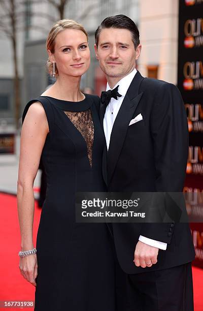 Clare Harding and Tom Chambers attend The Laurence Olivier Awards at The Royal Opera House on April 28, 2013 in London, England.