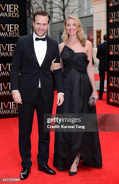 Rafe Spall and Elize du Toit attend The Laurence Olivier Awards at The Royal Opera House on April 28, 2013 in London, England.