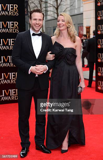 Rafe Spall and Elize du Toit attend The Laurence Olivier Awards at The Royal Opera House on April 28, 2013 in London, England.