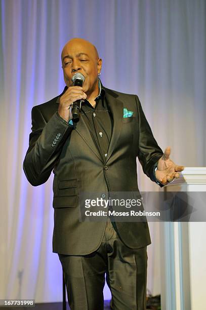 Recording Artist Peabo Bryson performs at the Care For Congo Gala 2013 at the St. Regis Hotel on April 13, 2013 in Atlanta, Georgia.