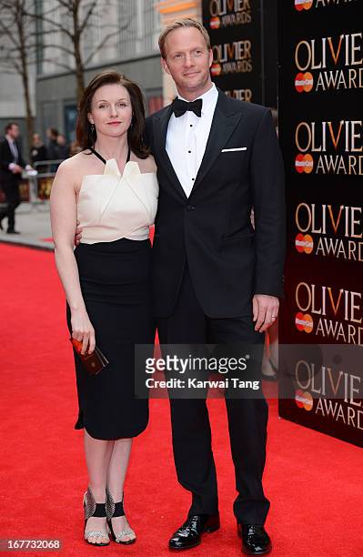 Dervla Kirwan and Rupert Penry Jones attends The Laurence Olivier Awards at The Royal Opera House on April 28, 2013 in London, England.
